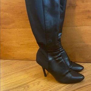 Tall black leather boots